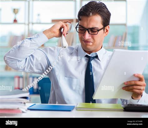 The businessman suffering from excessive armpit sweating Stock Photo - Alamy