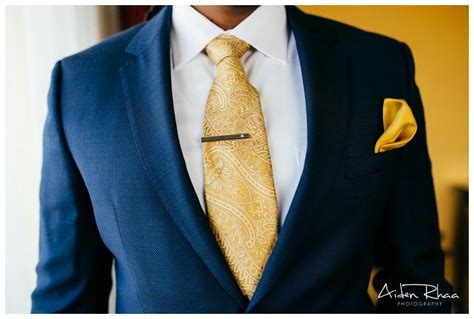 Navy Suit and Gold Tie