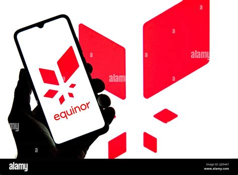 In this photo illustration a Equinor ASA logo seen displayed on a ...