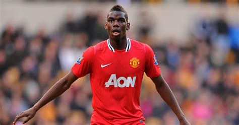 Paul Pogba playing for Manchester United against Wolves. Old Trafford ...