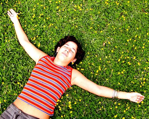 Free girl laying on the grass Stock Photo - FreeImages.com