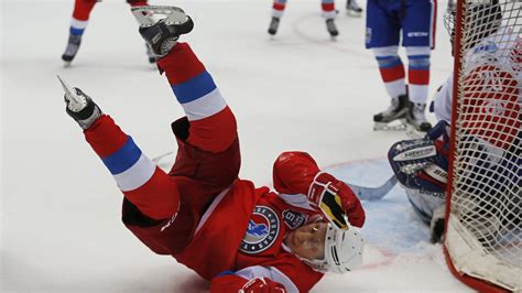 Vladimir Putin floored during ice hockey match