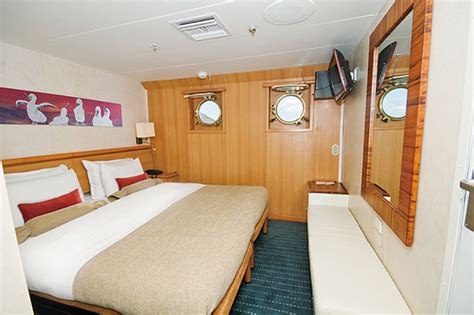 Galapagos Legend cabins and suites | CruiseMapper