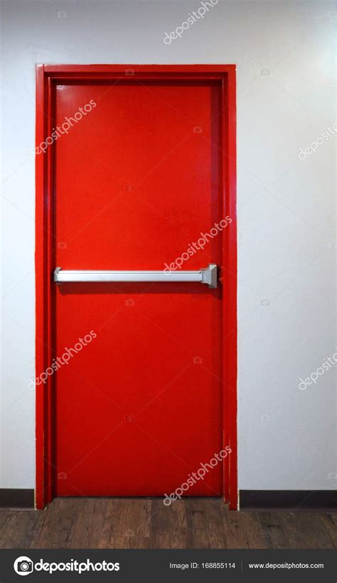 Emergency fire exit door red color. — Stock Photo © gnepphoto #168855114