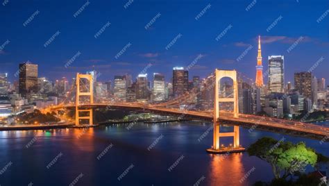 Premium AI Image | Tokyo skyline with rainbow bridge and Tokyo tower ...