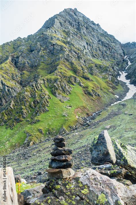 Shiva Linga made of rocks, a symbol of Lord Shiva in Hindu Mythology with Glacier mountains In ...