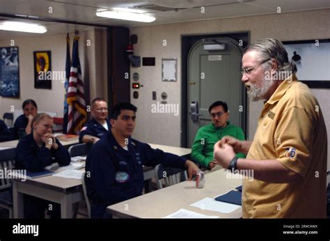 US Navy Naval College Program for Afloat College Education (NCPACE) instructor teaches a U.S ...