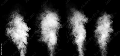 Set of real white steam isolated on black background with visible ...