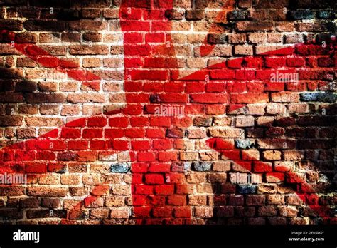 Union jack flag graffiti on an old brick wall grunge background Stock ...