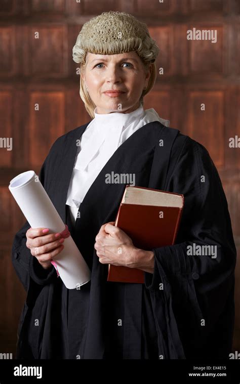 Portrait Of Female Lawyer In Court Holding Brief And Book Stock Photo ...