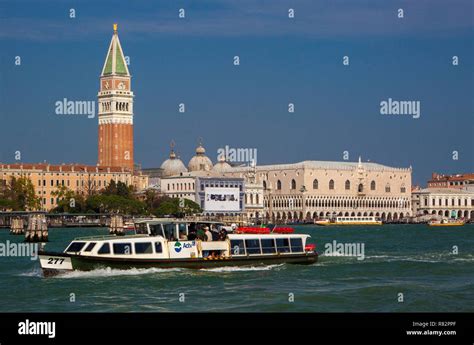 Vaporetto (ferry) crossing the Lido di Venezia in front of Saint Mark's square in Venice, Italy ...