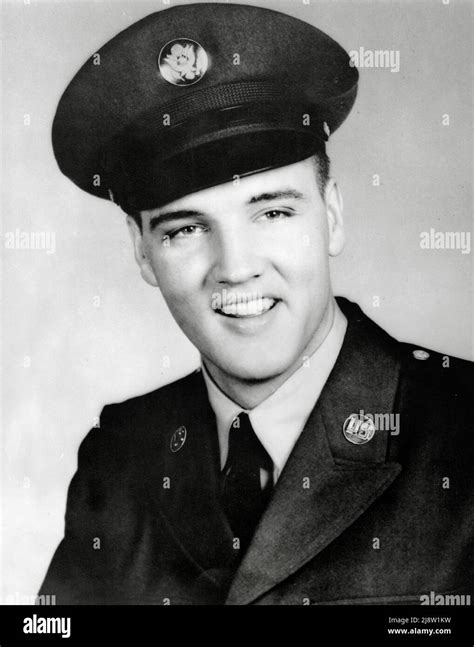 Elvis Presley, in his army uniform, circa 1958. File Reference # 34145 ...