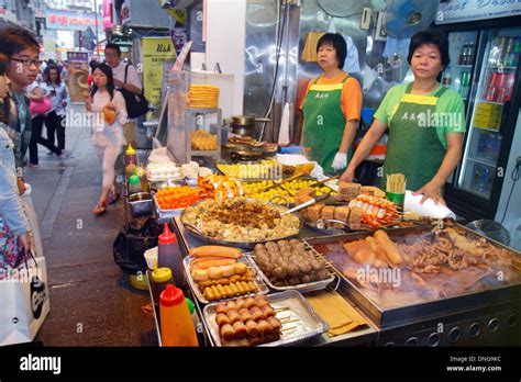 Hong Kong China Kowloon Mong Kok Nathan Road street food vendor Asian ...