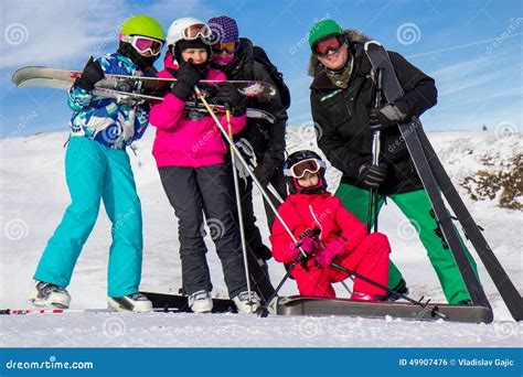 Family on the ski vacation stock photo. Image of equipment - 49907476