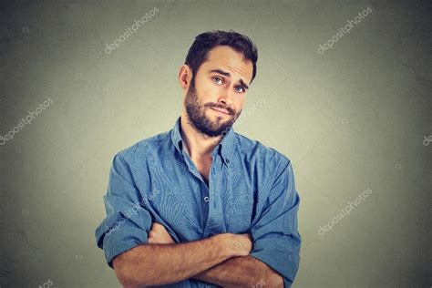 Skeptical man looking suspicious, some disgust on his face — Stock Photo © SIphotography #86973392