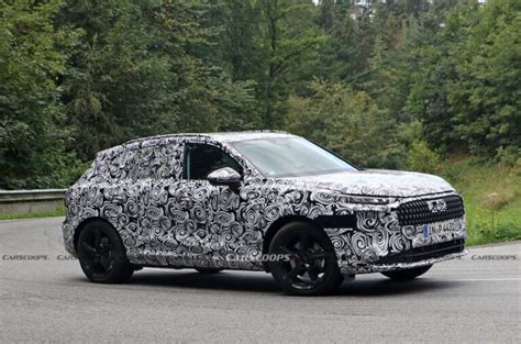 2025 Audi Q3 Spied Looking Like A Baby Q6 E-Tron With ICE Power | Carscoops