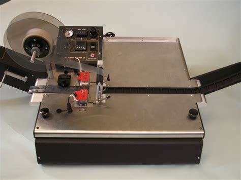 Tape and Reel Packaging Machine – Mid America Taping and Reeling