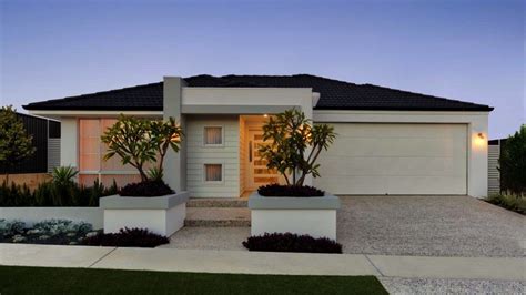 Modern single house plan for a narrow lot with attached two car garage.