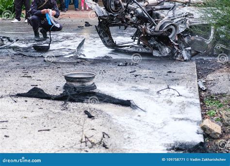 Burned Car after an Accident on the Road. Police at the Scene of the Accident. Stock Image ...