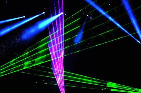 Premium Photo | Disco light show stage lights with laser