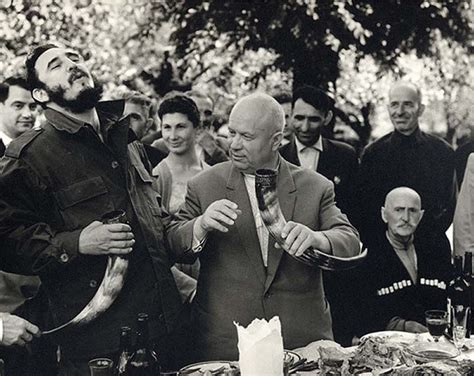 Fidel Castro and Nikita Khrushchev drinking wine from a drinking horn ...