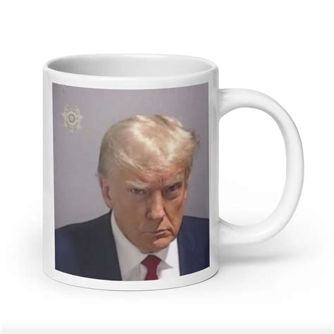 Trump's Mug Shot Merchandise—T-Shirts, Mugs, Buttons