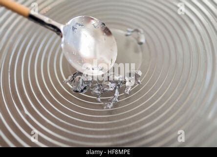 Pouring molten lead on New Year's Eve Stock Photo - Alamy