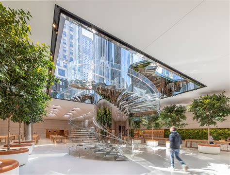 Apple's Fifth Avenue flagship reopens with famed glass cube and new ...