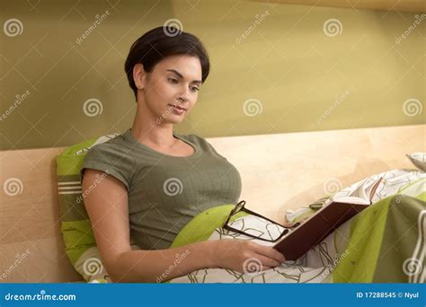 Woman reading in bed stock image. Image of enjoying, leisure - 17288545