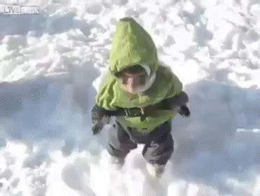 Monkey In Winter Coat Jumps In Snow GIF - Monkey Cute Funny - Discover & Share GIFs