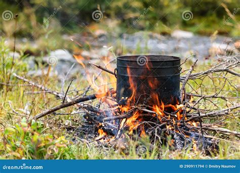 Cooking Camp Food in Cauldron on Open Fire Stock Photo - Image of boil ...