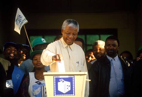 Nelson Mandela casts his vote in South Africa's first democratic general elections in 1994 ...