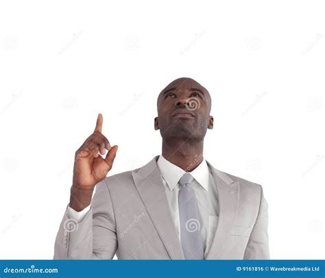 Businessman pointing up stock photo. Image of person, ethnic - 9161816