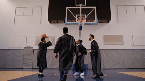 Men in Graduation Gown Playing Basketball · Free Stock Video