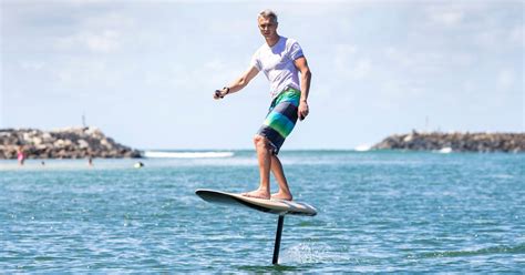 This Electric Hydrofoil Surfboard Lets You Float Above The Water - Maxim