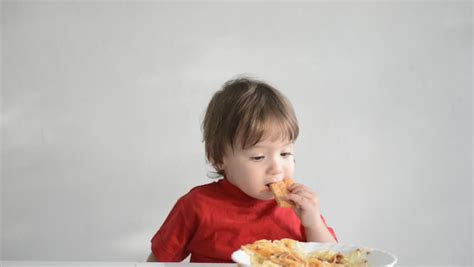 Baby Child Eating Spaghetti At Home In Living Room Stock Footage Video 4006399 | Shutterstock