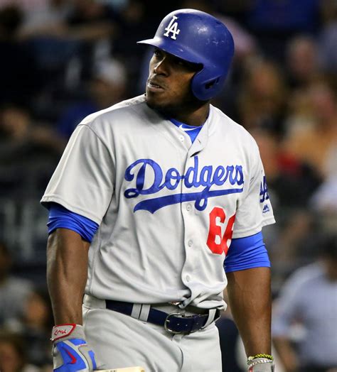 The Dodgers' Yasiel Puig heads back to the dugout after st… | Flickr