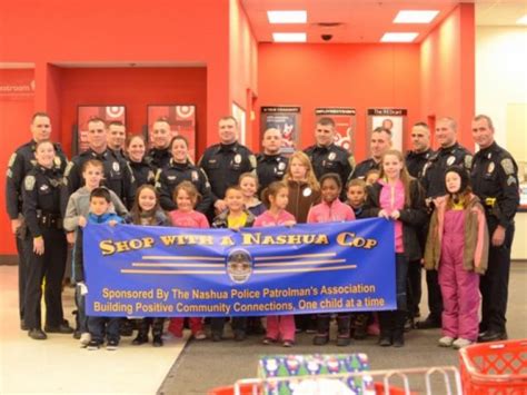 Nashua Police Officers Donate Holiday Gifts For City Children - Nashua, NH Patch