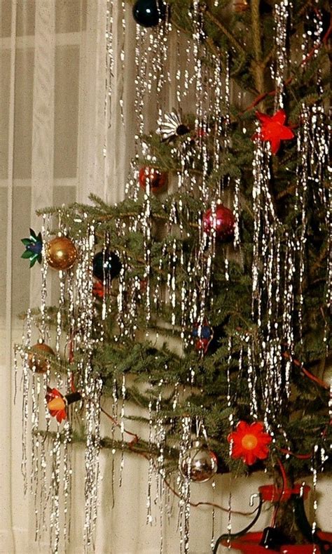 Christmas Tree Tinsel 1942 - Google Search | Tinsel christmas tree, Christmas decorations, Retro ...