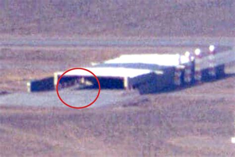 Mysterious triangular shape spotted in Area 51 hangar as spy agencies ...