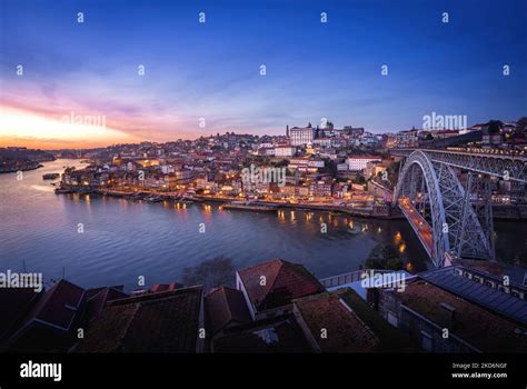Illuminated Porto Skyline with Douro River and Dom Luis I Bridge at sunset - Porto, Portugal ...
