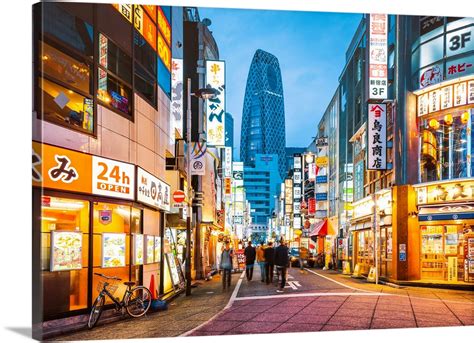 Shinjuku, Tokyo, Japan, Illuminated Neon Signs At Dusk And Cocoon Tower ...