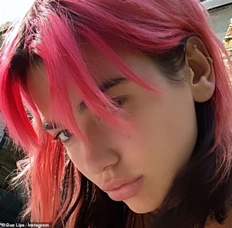 Dua Lipa flaunts her new cherry red tresses in smouldering selfie ...