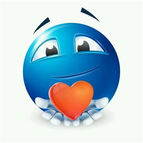 a blue smiley face holding a heart in it's mouth with eyes wide open