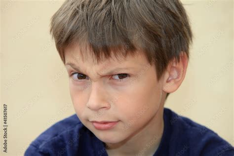 confused boy with funny facial expression Stock Photo | Adobe Stock