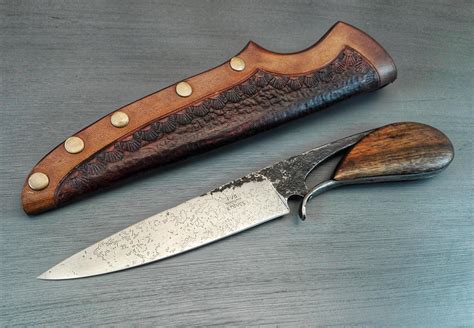 Hey all! Here's a Blacksmith's knife I finished up recently. 5160 and Imbuia. Thanks for looking ...