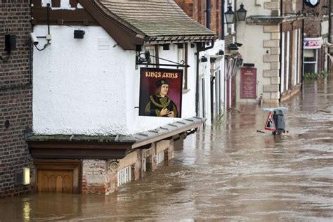 York floods pictures reveal devastation as ruined wine bar swamped by ...