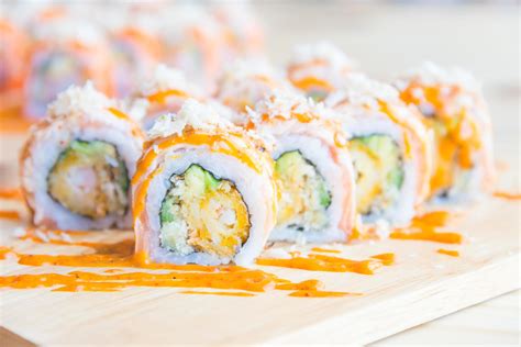 Salmon sushi roll, traditional Japanese food 2144593 Stock Photo at Vecteezy