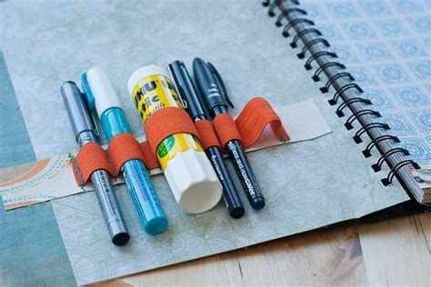 Or keep things handy by installing a pen holder in their notebook. | Smash book, Diy back to ...