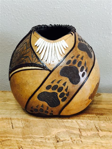 Hand carved and painted gourd. Embellished with leather and beads. | Painted gourds, Gourd art ...